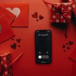 A romantic proposal scene featuring gifts, red envelopes, and a 'Will You Marry Me?' phone call.